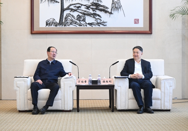 丁焰章與中國華能董事長、黨組書記溫樞剛會談